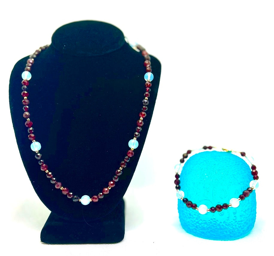 Faceted Garnet, Smooth Opal, and Gold Set